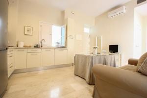 A television and/or entertainment centre at Apartamento Centro San Luis