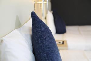 Postel nebo postele na pokoji v ubytování Hotel Sunroute Stellar Ueno