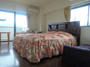 Кровать или кровати в номере Nikko Park Lodge Tobu Station