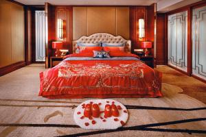 Letto o letti in una camera di Wyndham Jingzhou
