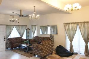 Posezení v ubytování Tun Perak Homestay