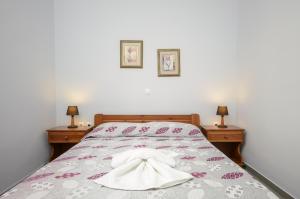 Posteľ alebo postele v izbe v ubytovaní NAXOS HOUSE