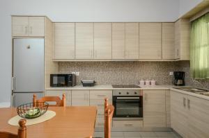 Kuchyňa alebo kuchynka v ubytovaní NAXOS HOUSE