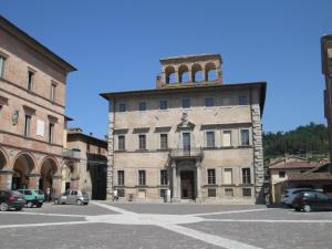 an old building with a tower on top of it at Casa Balducci Bed&Breakfast in Mercatello sul Metauro