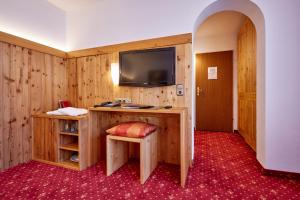 TV a/nebo společenská místnost v ubytování Hotel Franziska