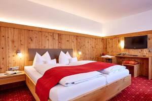 Postel nebo postele na pokoji v ubytování Hotel Franziska