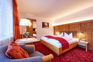 Postel nebo postele na pokoji v ubytování Hotel Franziska