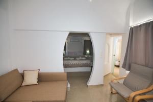 Un lugar para sentarse en Caldera View Resort - Adults Only