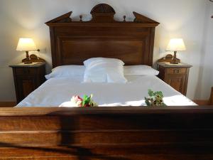A bed or beds in a room at El Sequer Casa Rural