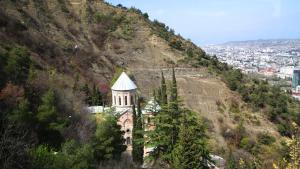 a building on the side of a mountain at Aleqsandra in Tbilisi City