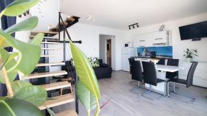 Μια τηλεόραση ή/και κέντρο ψυχαγωγίας στο Apartment Segnia