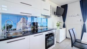 Η κουζίνα ή μικρή κουζίνα στο Apartment Segnia