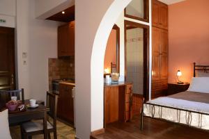 A bed or beds in a room at Dolphin Studios