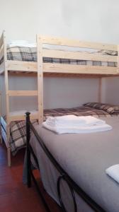 Postel nebo postele na pokoji v ubytování B&B Bucaneve