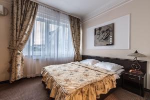 Posteľ alebo postele v izbe v ubytovaní Wzgórze Toskanii Conferences & Restaurant + 37 fotografií