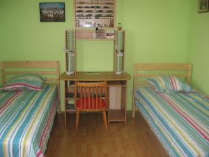 A bed or beds in a room at Bella