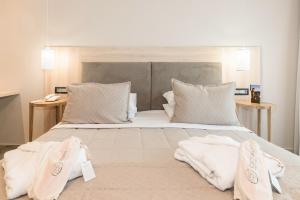 Letto o letti in una camera di Venus Hotel