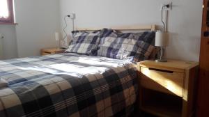 Postel nebo postele na pokoji v ubytování B&B Bucaneve
