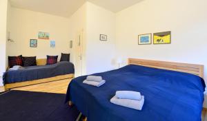 Posteľ alebo postele v izbe v ubytovaní House With Courtyard & Parking Close To Stadtpark