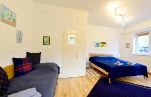 Posteľ alebo postele v izbe v ubytovaní House With Courtyard & Parking Close To Stadtpark
