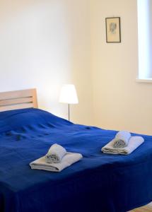 Posteľ alebo postele v izbe v ubytovaní House With Courtyard & Parking Close To Stadtpark