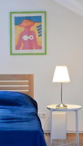 Posteľ alebo postele v izbe v ubytovaní House With Courtyard & Parking Close To Stadtpark