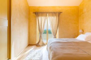 Postel nebo postele na pokoji v ubytování Luxury Villa Tia