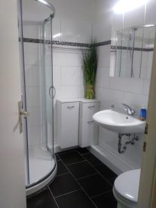 Koupelna v ubytování Apartmenthotel Hohegeiß Kasing MIT FREIEM WLAN und Schwimmbad