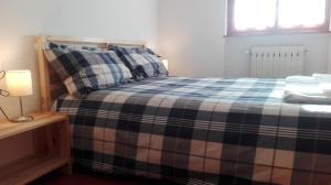 Postel nebo postele na pokoji v ubytování B&B Bucaneve