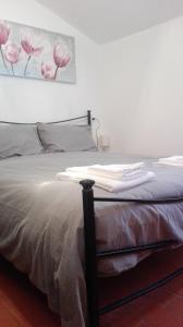 Postel nebo postele na pokoji v ubytování B&B Bucaneve