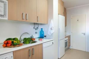 
A kitchen or kitchenette at Dream's House
