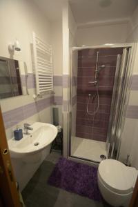 Koupelna v ubytování B&B LA BAIA Sea Rooms + 37 fotografií