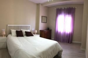 Posteľ alebo postele v izbe v ubytovaní El piso de la Calzada