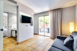 TV a/nebo společenská místnost v ubytování Occidental Playa de Palma