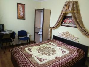 A bed or beds in a room at Old Castle Hotel