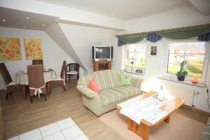 Μια τηλεόραση ή/και κέντρο ψυχαγωγίας στο Wohnung Inge Ysker +5 φωτογραφίες