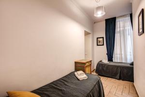 Postel nebo postele na pokoji v ubytování Four Rivers Suites