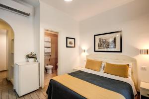 Postel nebo postele na pokoji v ubytování Four Rivers Suites