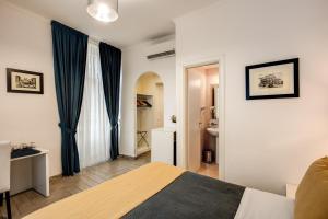 Postel nebo postele na pokoji v ubytování Four Rivers Suites