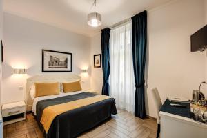 Postel nebo postele na pokoji v ubytování Four Rivers Suites