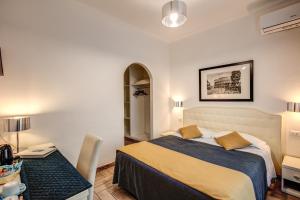 Postel nebo postele na pokoji v ubytování Four Rivers Suites