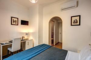 Postel nebo postele na pokoji v ubytování Four Rivers Suites