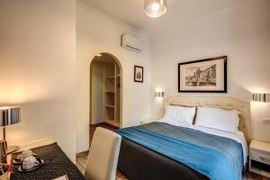 Postel nebo postele na pokoji v ubytování Four Rivers Suites