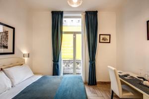 Postel nebo postele na pokoji v ubytování Four Rivers Suites