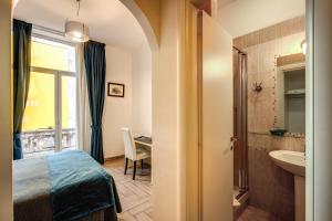 Postel nebo postele na pokoji v ubytování Four Rivers Suites