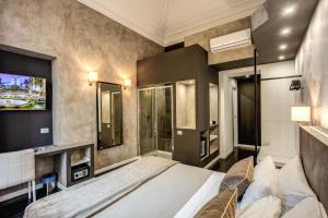 TV a/nebo společenská místnost v ubytování Four Rivers Suites
