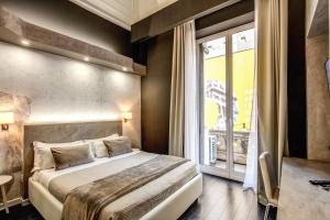 Postel nebo postele na pokoji v ubytování Four Rivers Suites
