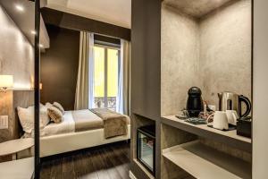 Postel nebo postele na pokoji v ubytování Four Rivers Suites