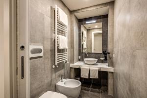 Koupelna v ubytování Four Rivers Suites