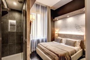 Postel nebo postele na pokoji v ubytování Four Rivers Suites